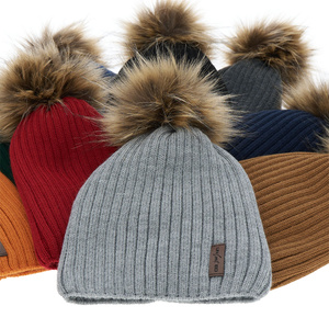 Boy's winter hat orange Amur with pompom