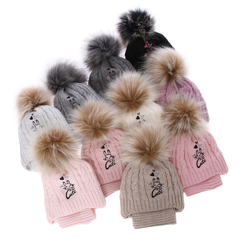 Girl's winter set: hat and tube scarf grey Treccia with pompom