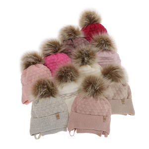 Girl's winter set: pink hat and tube scarf with pompom Egeria