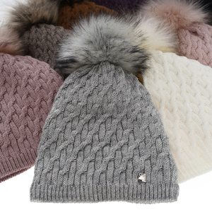 Woman's winter hat grey Kaskada with pompom