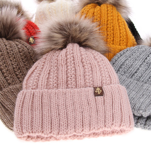 Woman's winter hat red Rene with pompom