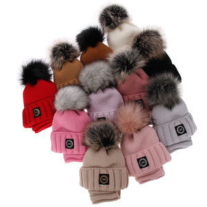 Girl's winter set: hat and tube scarf black Hendi with pompom