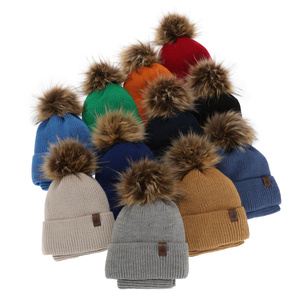 Boy's winter set: hat and tube scarf beige with pompom Modus