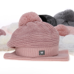 Girl's winter set: hat and tube scarf beige Lira with pompom