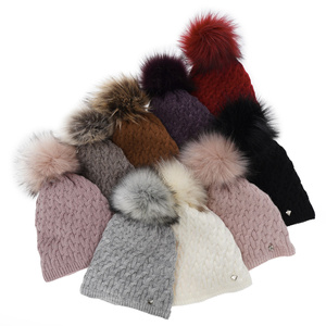 Woman's winter hat pink Kaskada with pompom