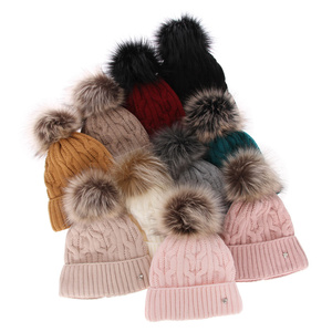 Woman's winter hat black Laona with pompom